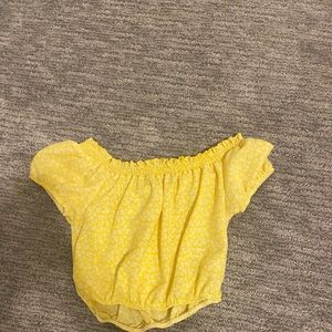 This is a yellow off the sleeves top